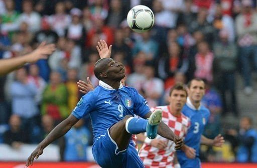 Italy's Mario Balotelli eyes the ball during his side's Euro 2012 match against Croatia